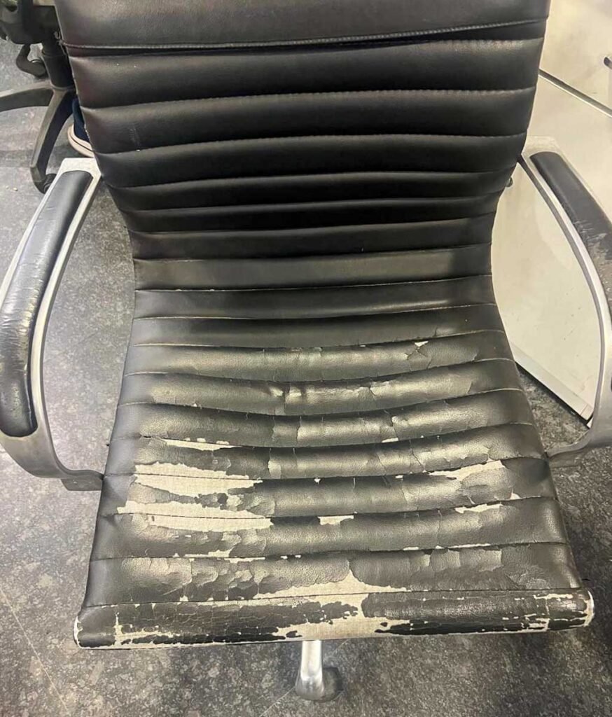 damaged office chair leather seat before refurbishment