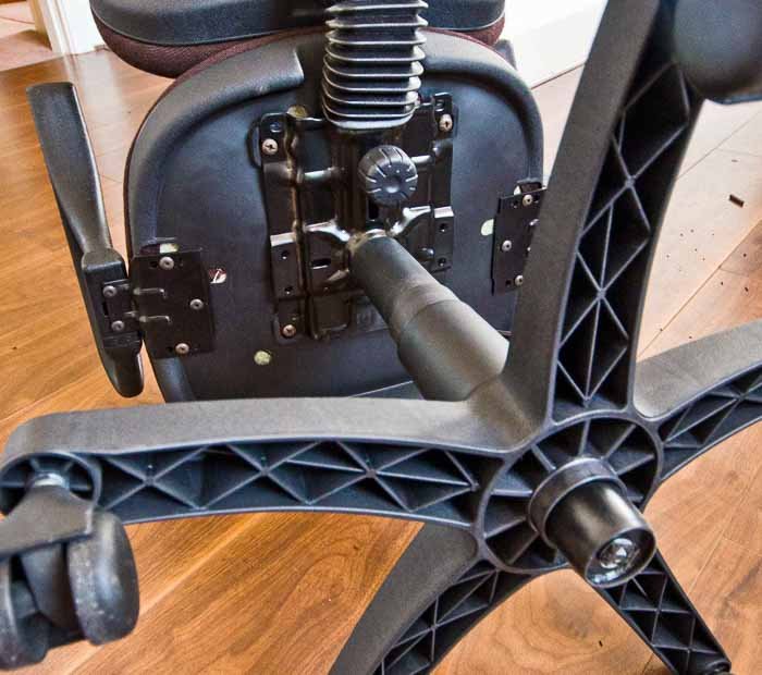 office chair base and wheel inspection during maintenance